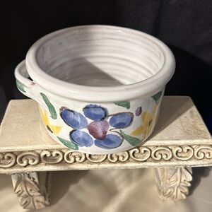 Hand painted, terra cotta wine holder.